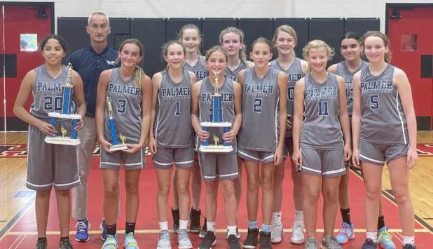 Palmer Catholic Academy girls basketball team gathers after victory at Bishop Kenny. (photo submitted)