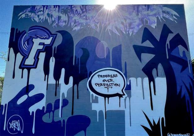 Art by Kyle Montiero added to Maggie Paxton memorial ball wall. (photo submitted)