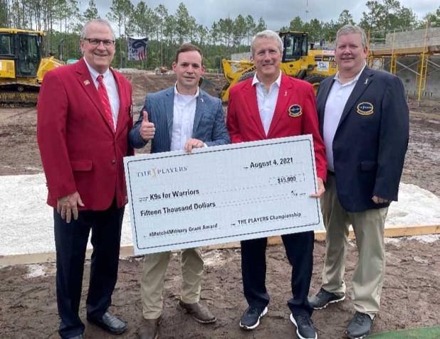 (From left) Murray Beard, past tournament chairman; Rory Diamond, CEO of K9s For Warriors; Matt Welch, 2022 tournament chairman; and Lee Nimnicht, 2022 tournament vice-chairman (photo submitted)