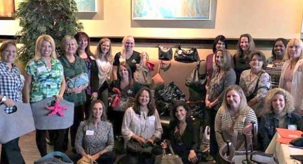 The local chapter of the Polka Dot Powerhouse shows its love and support to homeless women at the Beaches, partnering with Mission House for Project Pocketbook. (photo submitted)