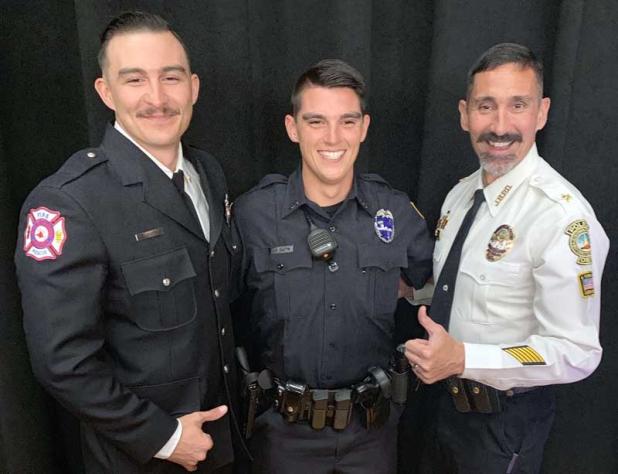 Jacksonville Beach Police Chief Gene Paul Smith, right, is shown with his sons, Zachary Smith, left, and John Paul Smith.