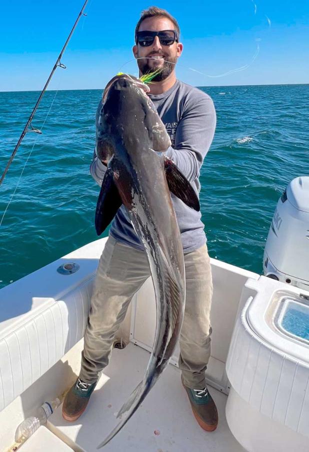 Local surf legend and fellow cobia fishing addict Justin Quintal shows off a great beach fish caught recently with Southern Cross Fishing Team. (photo submitted)