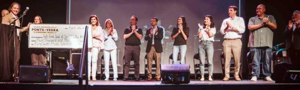 The Friends of Ponte Vedra Concert Hall present a check for $4,000 to the North Florida School of Special Education.