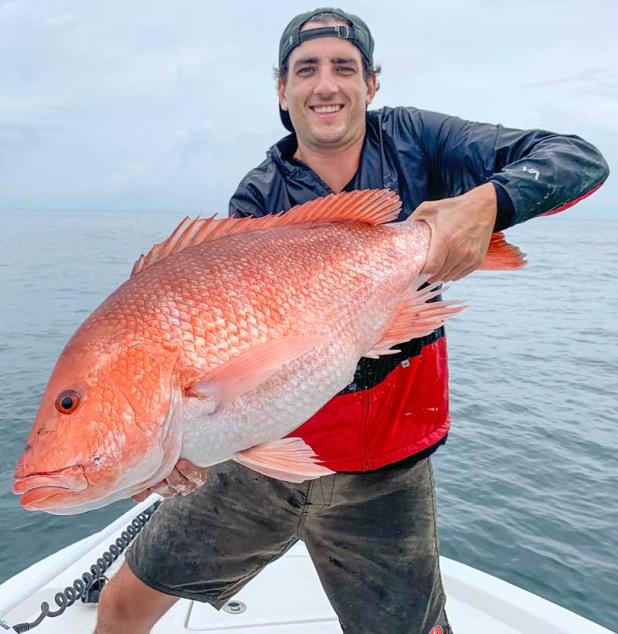 Guille VanCruysen with a healthy North Florida red snapper. (photo submitted)