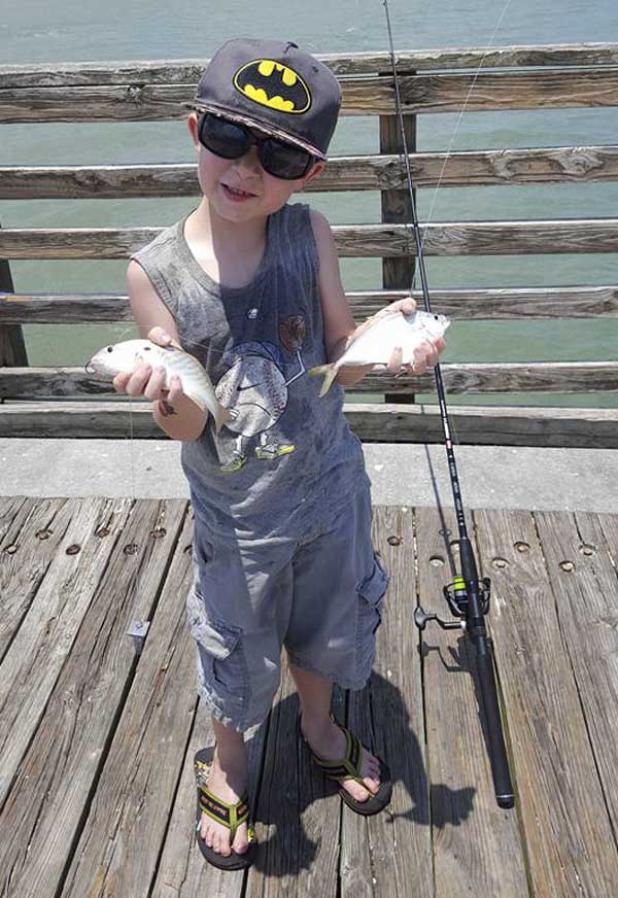 Jeff Altman’s grandson, Gavin, with his “double trouble” catch from the Jax Beach pier last weekend. (photo submitted)