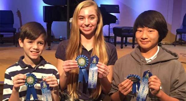 Best in show science fair winners Avin Porter (elementary), Alyssa Whitaker (high school) and Isaiah Wood (middle school). (photo submitted)