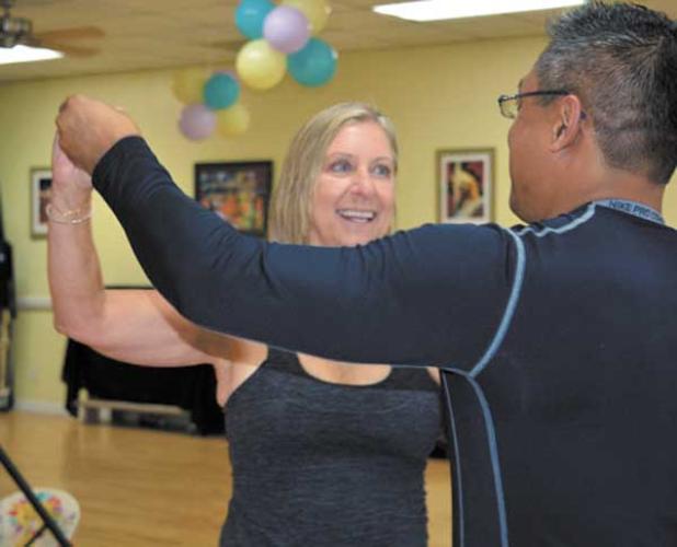 Nancy Chartrand and Larry Audije rehearse their routine. (photo via JAXDWTS.com)