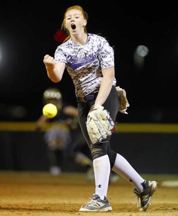 Fletcher High starting pitcher Jennifer Poston delivers to the plate in Feb. 12’s 7-2 softball victory over Sandalwood. Poston allowed four hits and two earned runs to notch her first victory of the season. (photo by Rob DeAngelo)