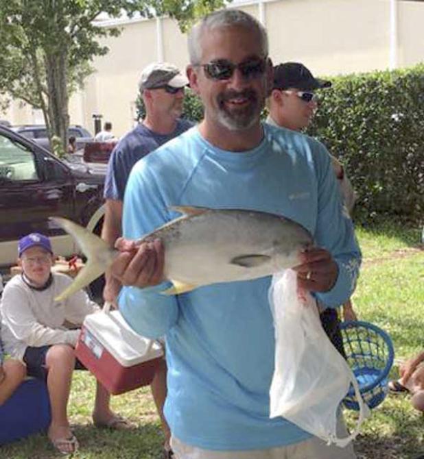 Jason Slavant with the first-place pompano from the Surfcasters tournament. (photo submitted)