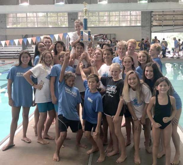 The Beaches Aquatic Club team celebrates their win at the River City Swim League Championships. (photo submitted)