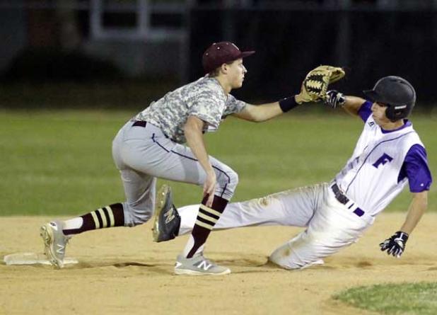 Fletcher High baserunner Bryce Johnson slides safely into second with a stolen base against Episcopal High during action March 2. The Senators went on to a 4-0 victory and, coupled with last Thursday’s 10-7 win over Westside, are in the midst of a four-game winning streak. (photo by Rob DeAngelo)