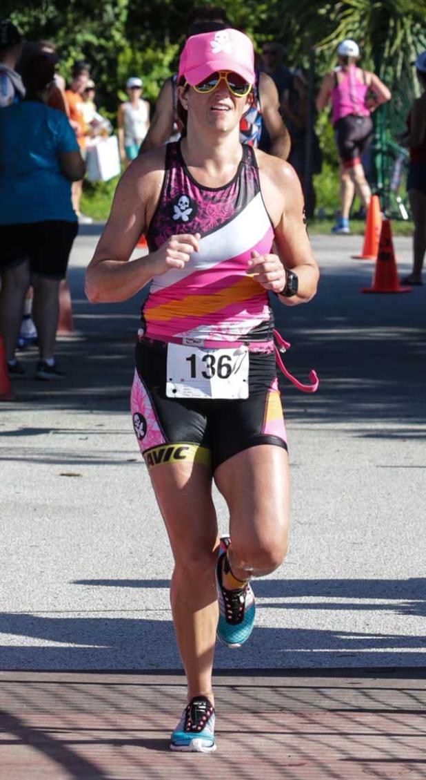 Jacksonville’s Heidi Austin is the first woman to reach the finish line in the sprint race. (photo by David Rosenblum)