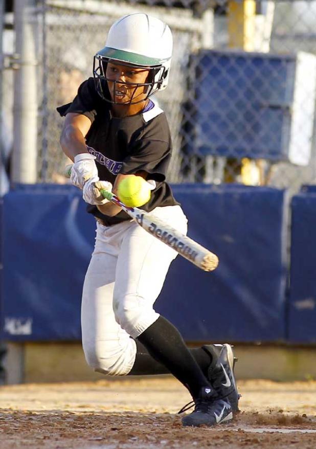 Fletcher High’s Naajizdah Nichols connects from the left side for a hit against Sandalwood in the Senators’ regular-season finale. (photo by Rob DeAngelo)