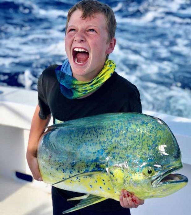 Asher Heath is all smiles with the mahi he caught with Capt. Jimmy Laidler out of Vilano recently. (photo submitted)