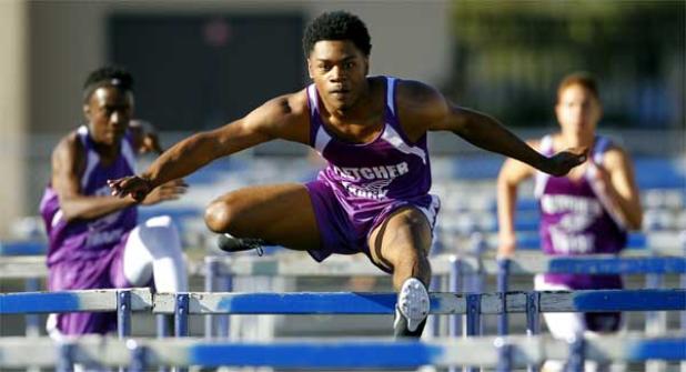 Fletcher High’s Tyriq Burns, center, on his way to winning the 110-meter high hurdles race in the Senators’ lone home track meet of the. Burns, a senior, took third in the event at the Gateway Conference meet at Mandarin High with a time of 15.18 seconds. (photos by Rob DeAngelo)