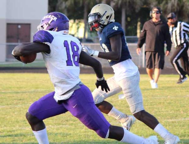 Fletcher's Myles Montgomery runs for one of his three touchdowns during the game. (photo submitted)