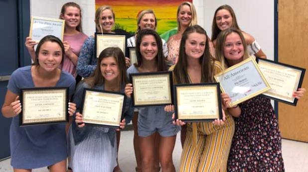 Coach Johnston and Ponte Vedra High School lacrosse players display their awards. (photo submitted)