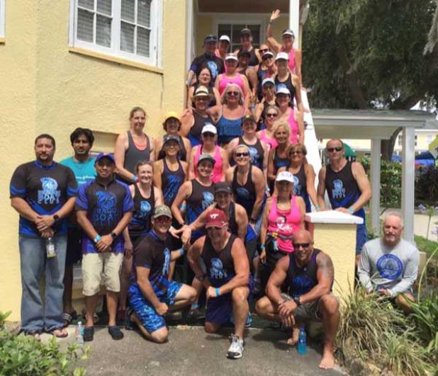 Members of the Mammoglams join members of the Jacksonville Dragon Boat Club for a group photo. (photo submitted)