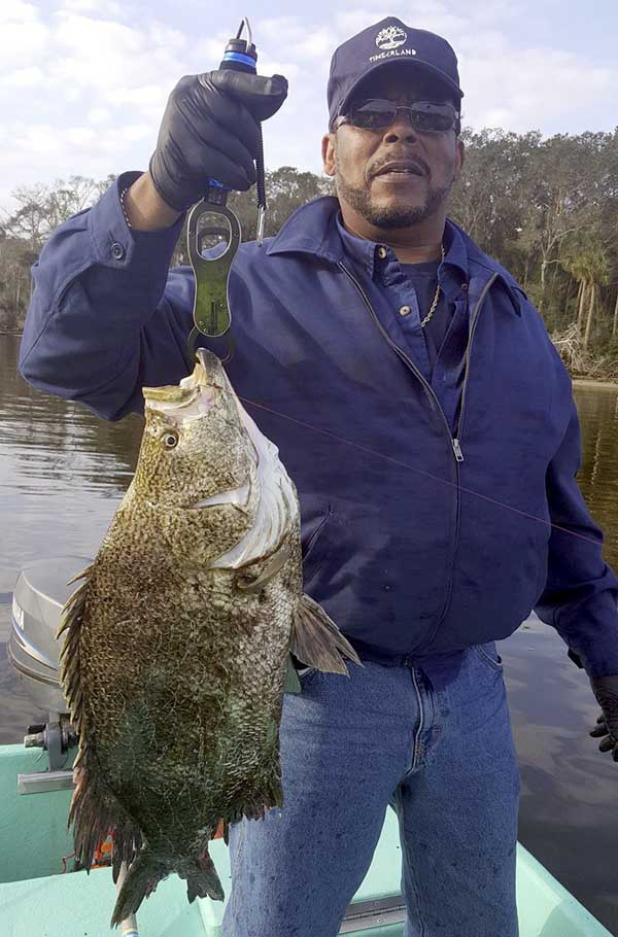 Rodney Lovan of Louisville, Ky., caught a creek triple tail while fishing with his son, local avid angler Rodney Moore, out of Palm Valley.