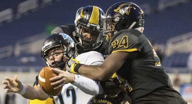 Ponte Vedra quarterback Nick Tronti stretches the ball past the goal line for a touchdown in the fourth quarter of the 5A state final against Plantation American Heritage. (photo by David Rosenblum)