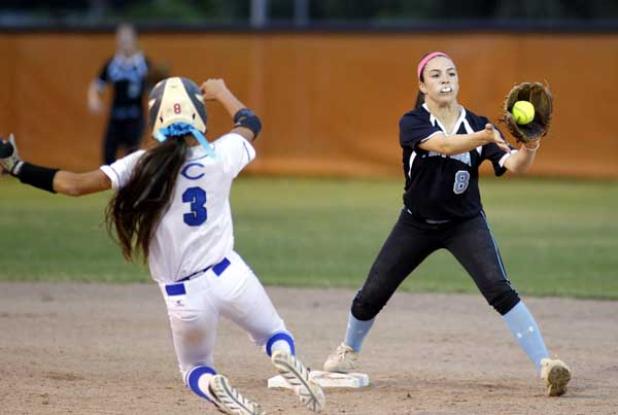 Ponte Vedra High shortstop Michelle Leone (8) takes the throw from second baseman Claudia Cotto as Clay High’s Allie Byrd (3) slides in trying to break up the Sharks’ double-play attempt. The Blue Devils runner was safe at first. (photo by Rob DeAngelo)