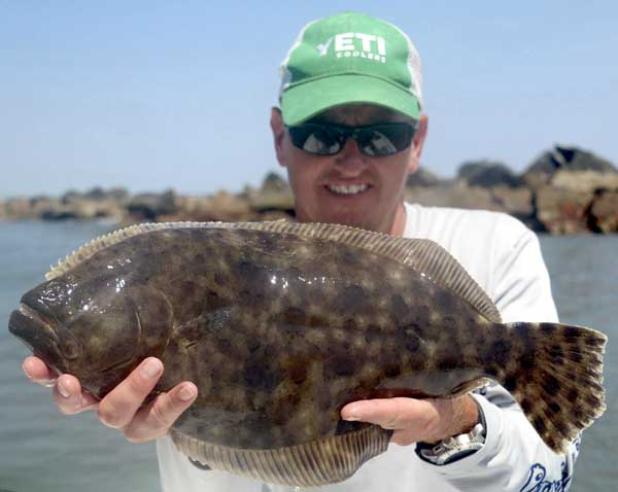 Ponte Vedra Beach's Steve Michals with a fine-looking flounder caught last weekend from the Mayport jetties. (photo submitted)
