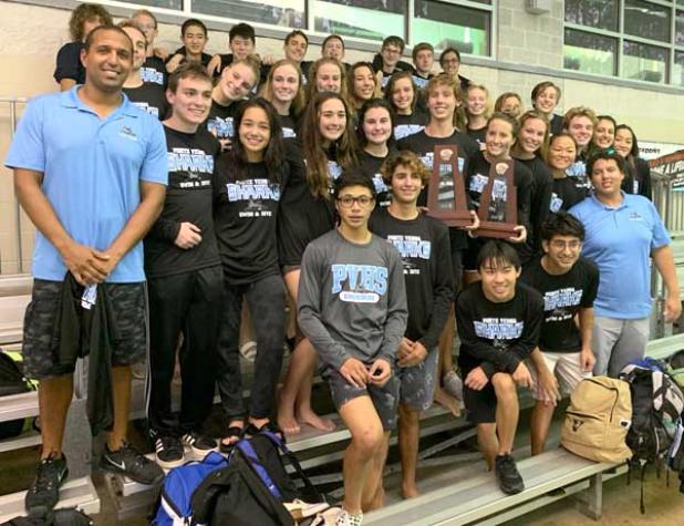 Sharks swim team members pose for a group photo. (photo submitted)