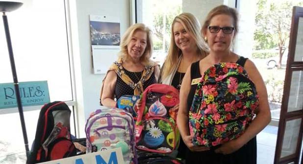 Berry & Co. Real Estate of Ponte Vedra Beach Realtors Carol Burns, Lauren Spiller and Clare Berry gather community donations to support Back to School with BEAM. (photo submitted)