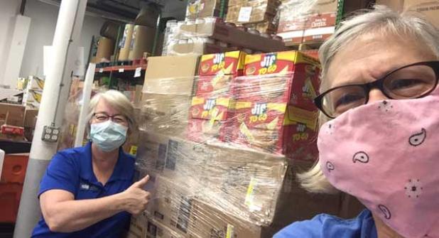 Executive Director Lori Richards and Oceanside Rotary Club member and BEAM volunteer Kelly Ballard.