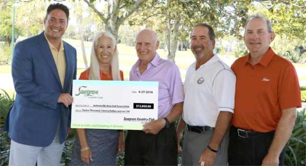 Pictured from left are Barry McDonald, general manager of Sawgrass Country Club; Salina Harkleroad, president of Sawgrass Country Club; and Ray Gottschalk, Randy Nader and Gregg Dieboldt, JAGA representatives and members of Sawgrass Country Club. (photo submitted)