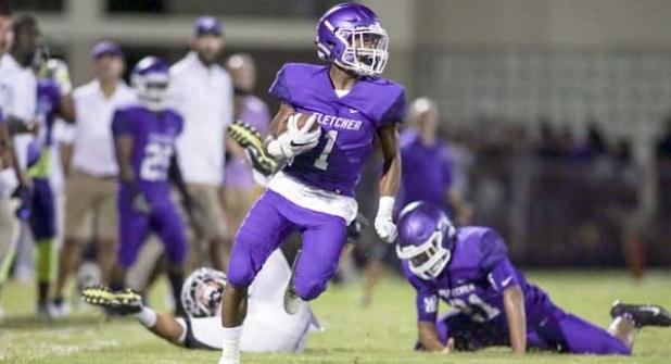 Senators running back Anthony Evelyn returns a punt in the third quarter against Providence. Evelyn added a touchdown in the win over the Stallions. (photo by David Rosenblum)