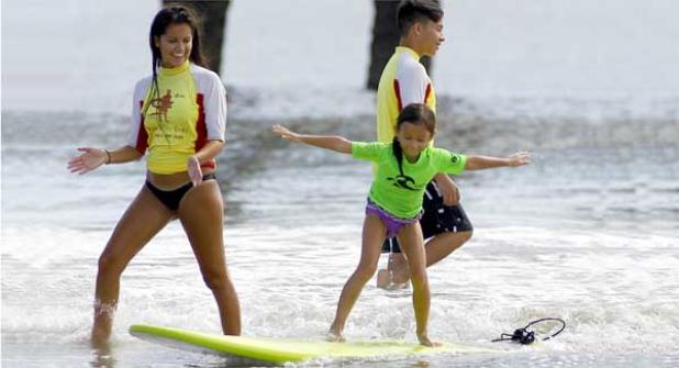 Perfect weather and tame surf conditions greeted youngsters during the first of last year’s three Super Grom Festival events on the south side of the Jacksonville Beach Pier. The series, now in its eighth year, begins Saturday with additional events on June 25 and July 30. Visit floridasurfing.org for additional information. (photo by Rob DeAngelo)