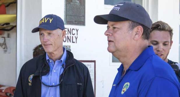 Florida Gov. Rick Scott and Jacksonville Beach Mayor Charlie Latham tour the American Red Cross Lifesaving station in Jacksonville Beach Oct. 9. The governor toured the Beaches area to assess damage. (photo by David Rosenblum)