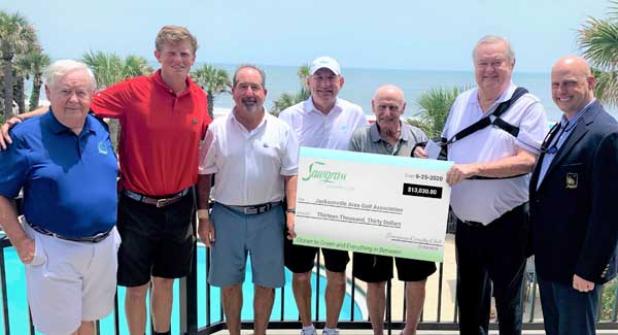 Tom Tomlin, Elliott Wright, Randy Nader, Gregg Deiboldt, Ray Gottschalk, Wayne St. Clair and CW Cook attend the donation by Sawgrass Country Club to Jacksonville Area Golf Association’s Scholarship Trust. (photo submitted)