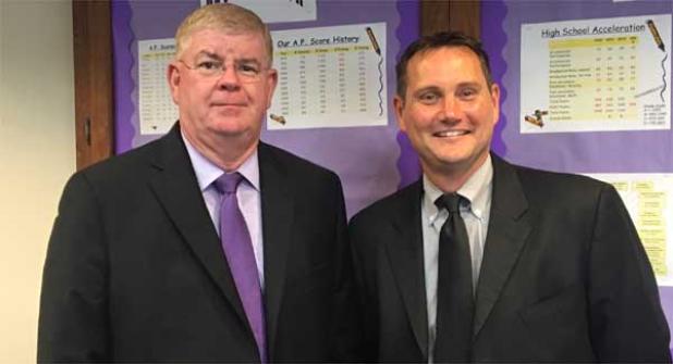 Outgoing Fletcher High School principal Don Nelson (left) welcomes new principal Dean Ledford to the Senator family. (photo by Chelsea Wiggs)