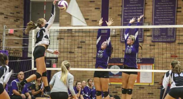 Fletcher High volleyball players Mia McKay (16) and Amanda Beane (10) attempt to block a shot by Ponte Vedra High’s Mackenzie Morris (1) during the volleyball match at Fletcher last Thursday. (photo by David Rosenblum)