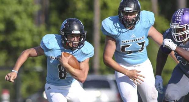 Ponte Vedra Sharks running back Hal Swan runs for yardage during the spring game last May against Fletcher high School. (photo by David Rosenblum)