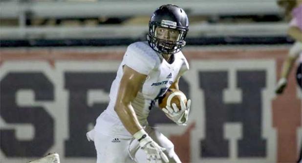 Sharks wide receiver Marshall Few runs all alone on a 41-yard touchdown pass from quarterback Nick Tronti in the final quarter against Bishop Kenny. The touchdown sealed the win for the Sharks. (photo by David Rosenblum)
