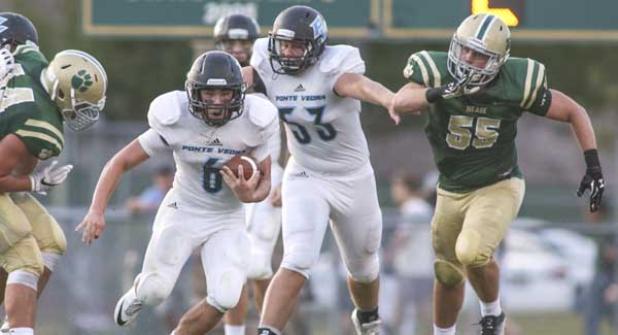 Ponte Vedra High running back Hal Swan (6) races past Nease defenders for some of his 121 yards gained over 18 carries in the season-opening win against the Panthers. (photo by David Rosenblum)
