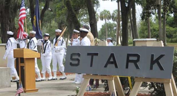 The restored stern plate from the USS Stark is displayed during Tuesday's ceremony. The plate was donated by Janna Ryals, whose brother, Seaman Earl Ryals, lost his life aboard the Stark on May 17, 1987. (photo by Chelsea Wiggs)