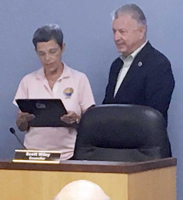 Mayor Harriet Pruette proclaims Sept. 21, 2016, as Councilor Scott Wiley Day. (photo by Chelsea Wiggs)