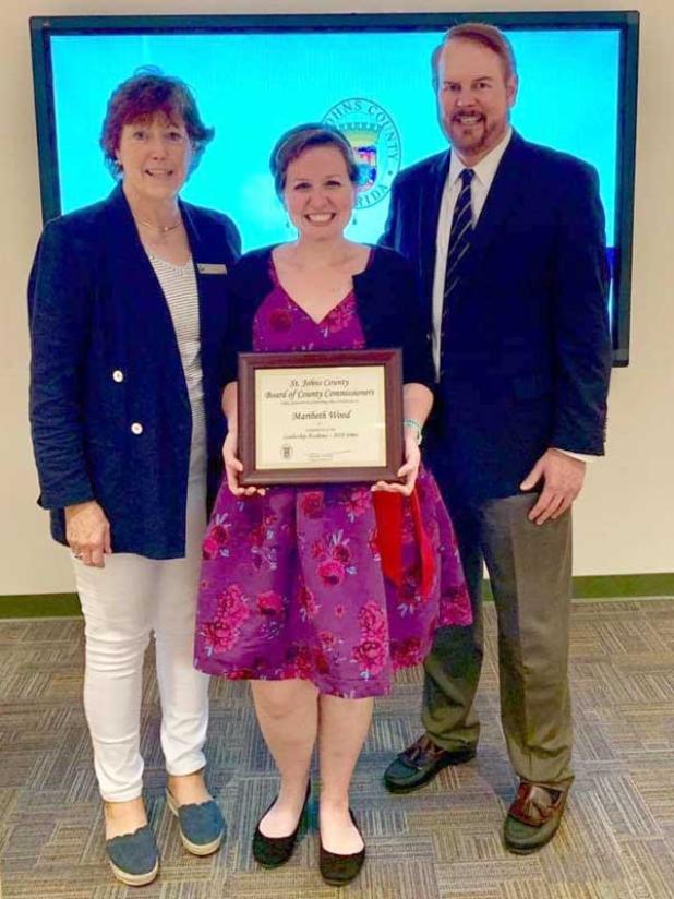 Maribeth Wood, center, is shown with Library Director Debra Rhodes Gibson and County Administrator Michael Wanchick. (photo submitted)