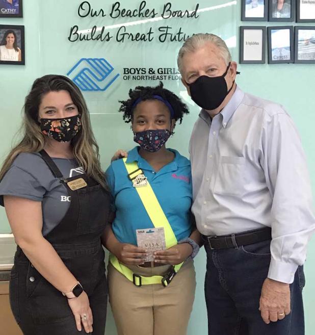 Audrey Clowe, unit director; Khaysi Scott Wilson; and Scott Wiley, program sponsor. (photo submitted)